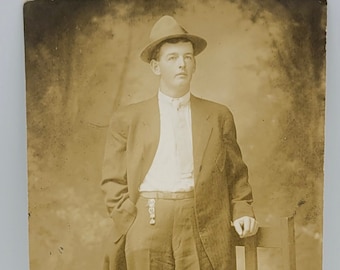 Sporting a Fedora & Watch Fob~RPPC~Man Posed in the Studio with a Backdrop~Photo Postcard