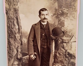 Cane & Bowler Hat~Cabinet Card Photo~Man Posed in Studio with Tree Props and Backdrop