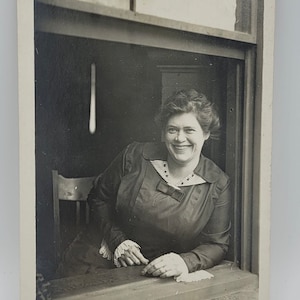 In the Window~RPPC~Smiling Woman Leaning Inside Window Sill~~Dated 1913~Photo Postcard