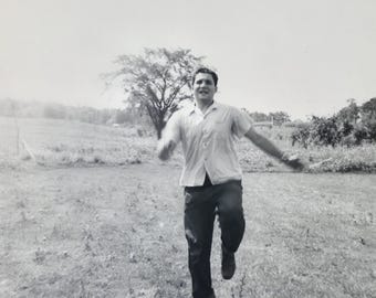 Man Skipping in a Field Vintage Photo, Man in Motion