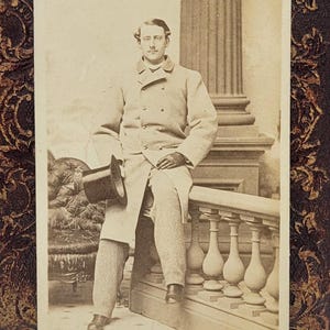 Man Holding Top Hat~CDV Photo~Wearing Gloves Long Coat~Posed Casually on Photo Prop
