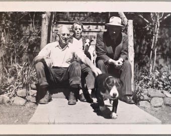 Two Dogs Front One on the Move Vintage Photo: Woman Facial Expression Holding Dog, Two Men