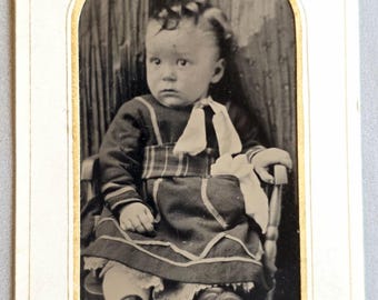 巻き毛の子供のティンタイプ写真、チャールズ・アルバート・スコットと判明