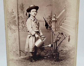 Little Girl with Watering Can~Cabinet Card Photo~Girl Posed in Studio "Watering Plant"