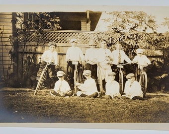 Boys with Bicycles Possibly Paper Boys~RPPC~Boys & One Girl~Five with Bikes~Most Wearing Caps~Photo Postcard