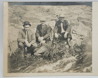 RPPC~Three Men Posed by Stream of Rushing Water~Rock Backdrop~Photo Postcard