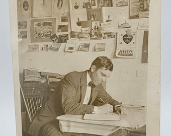 College Guy Studying~RPPC~Wall Full of Photos~Note "Getting to be a Kodak Fiend"~Photo Postcard