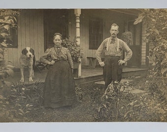 Wonderful Faces Including Dog~RPPC~Older Man & Woman Posed in Yard~Dog Posed Nearby on Porch