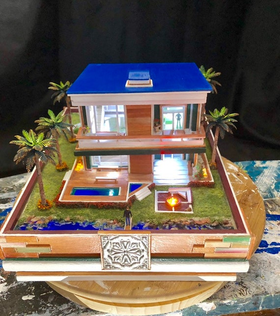 miniature house with lights