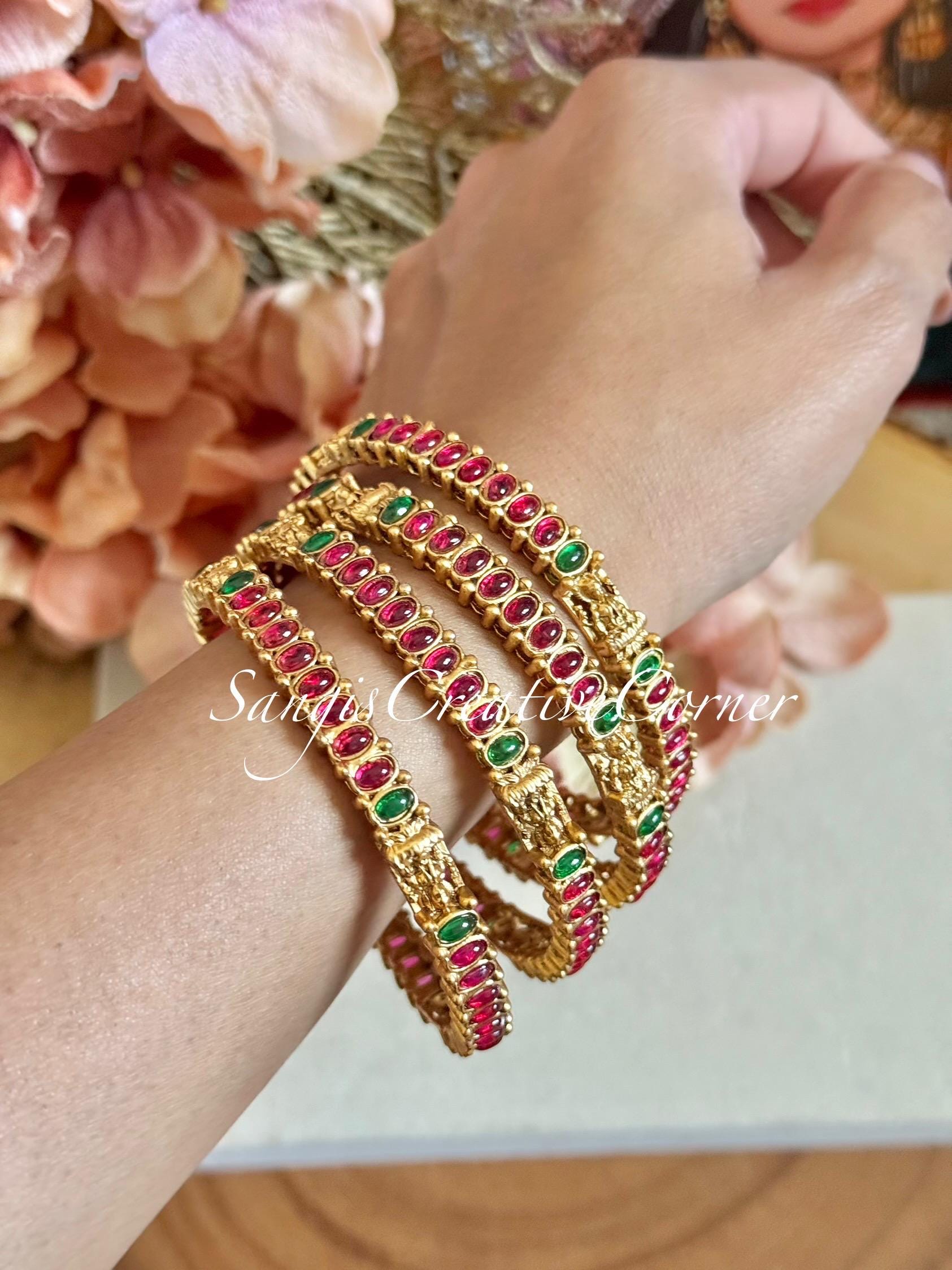 Temple Jewelry Bangles: Gold Lakshmi Carved Monalisa Stone Bangles (Set of 4)