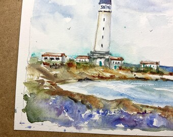 ブルターニュ地方のセイン島の灯台の風景。青い海とカモメが描かれた