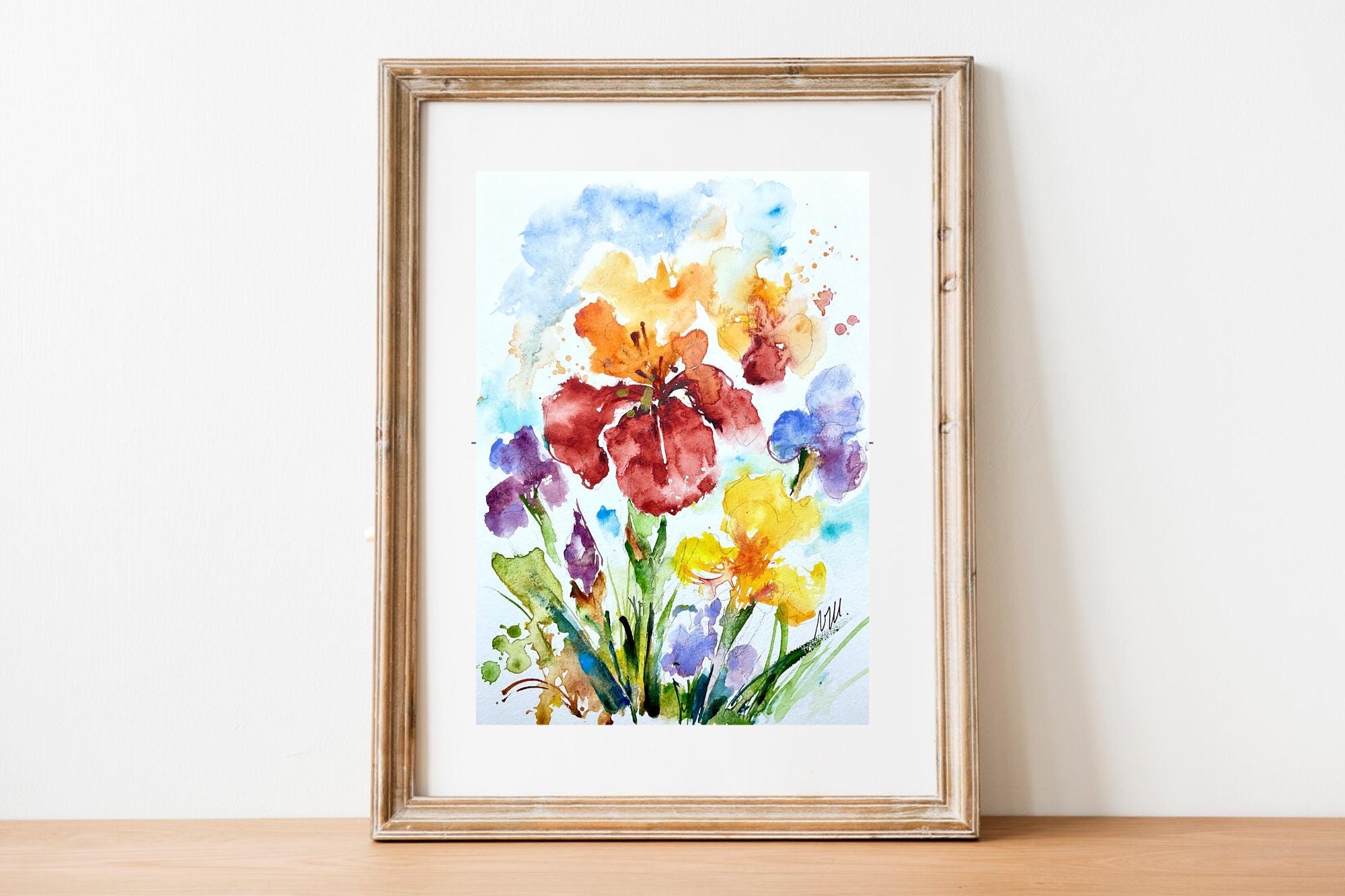 庭に咲く色とりどりのアヤメを描いたオリジナルの水彩画。春には鮮やか