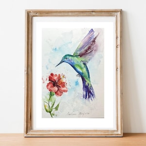Un colibri en peinture aquarelle originale, une petite illustration de cet oiseau multicolore exotique si aérien et poétique comme  un rêve