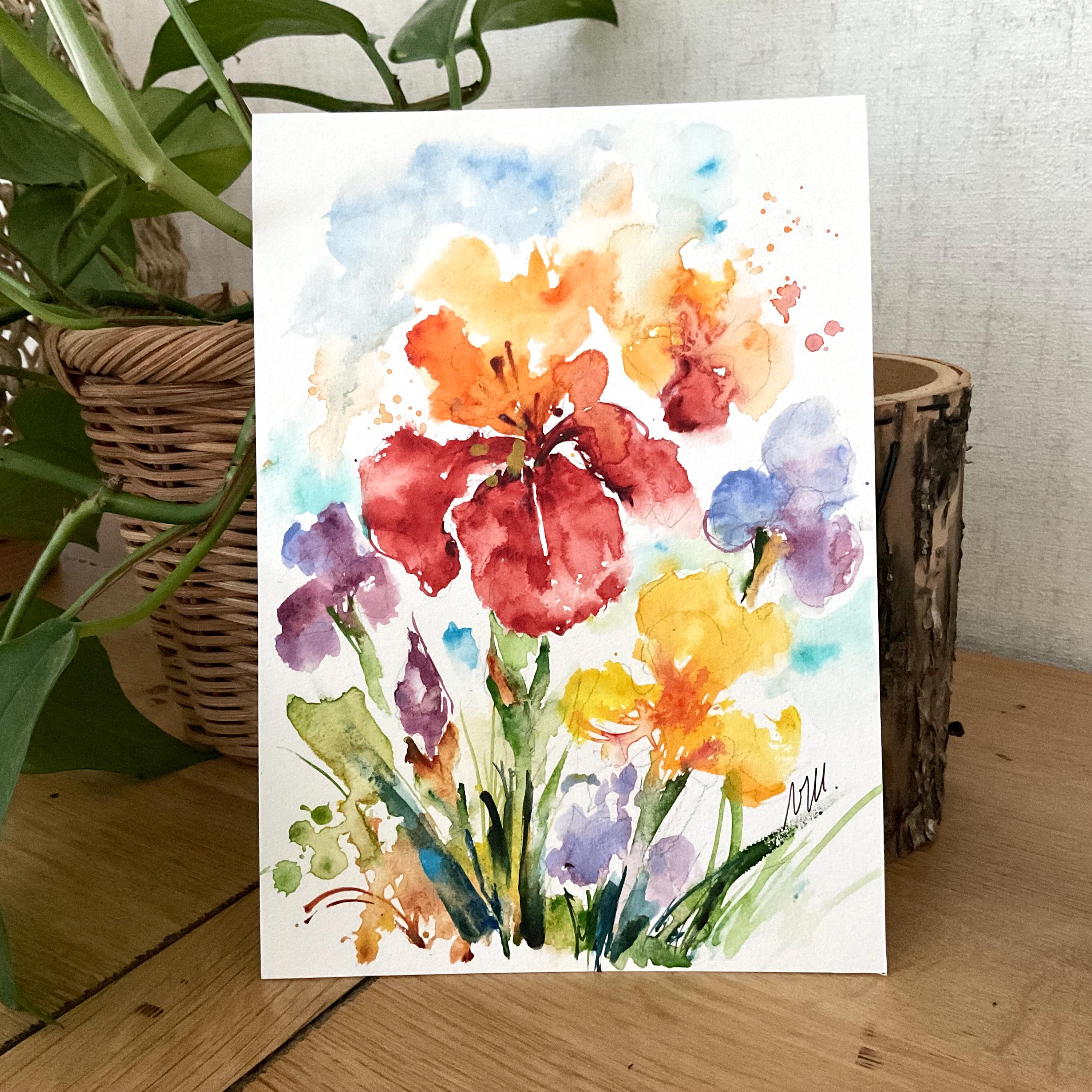庭に咲く色とりどりのアヤメを描いたオリジナルの水彩画。春には鮮やか
