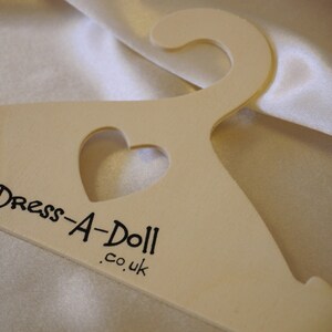 Dolls clothes coat hangers hotsell