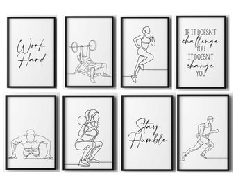 May include: Set of eight black framed motivational fitness posters with white backgrounds and black line drawings of people exercising. The posters include the text "Work Hard", "Stay Humble", "If it doesn't challenge you, it doesn't change you".