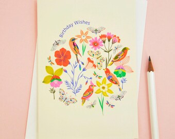 Puede incluir: Una tarjeta de cumpleaños con un diseño floral colorido con pájaros y mariposas. La tarjeta tiene el texto "Birthday Wishes" en la parte superior.