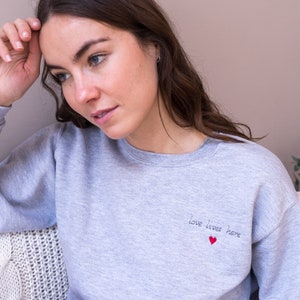 Love Lives Here - Love Lives Here Women&#39;s Jumper - Love Lives Here Embroidered Jumper - Women&#39;s Embroidered Jumper - Embroidered Sweater