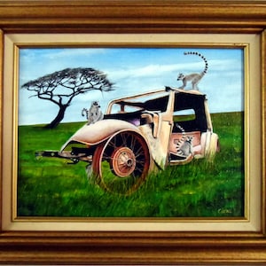 May include: A painting of a rusty, white car with a missing roof, sitting in a field of green grass. Three ring-tailed lemurs are sitting on the car. The sky is blue with white clouds. The painting is framed in a brown wooden frame.