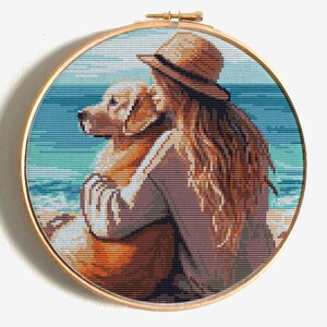 Girl with dog cross stitch pattern.