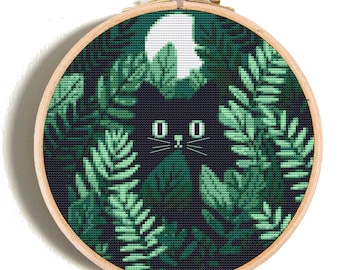Black cat cross stitch pattern, jungle leaves modern embroidery PDF. Cute Halloween cat stitch. Instant download.