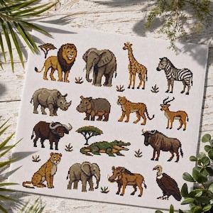 May include: A cross-stitch pattern on white fabric featuring a collection of African wildlife including a lion, elephant, giraffe, zebra, rhinoceros, hippopotamus, leopard, gazelle, buffalo, crocodile, wildebeest, and vulture with small trees.