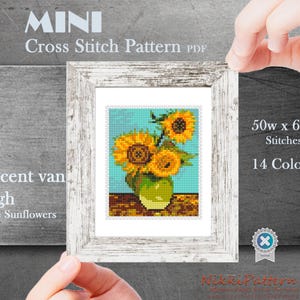 A cross stitch pattern of Vincent van Gogh's Three Sunflowers. The pattern is in a white frame and shows three sunflowers in a vase. The pattern is 50 stitches wide and 60 stitches high and uses 14 colors. The text 'MINI Cross Stitch Pattern PDF' is at the top of the image. The text 'Vincent van Gogh Three Sunflowers' is on the left side of the image. The text '50w x 60h Stitches 14 Colors' is on the right side of the image.