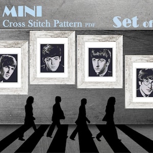 May include: Mini cross stitch pattern set of four framed portraits of The Beatles band members. The portraits are in black and white, with a distressed white frame. Silhouettes of people crossing a street are in the foreground.