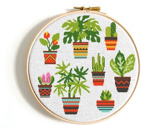 Kruissteekpatroon planten, cactussen op de geometrische potten, bloemenborduurwerk, moderne moderne kamerplanten, eenvoudige doe-het-kamerinrichting, digitaal instant