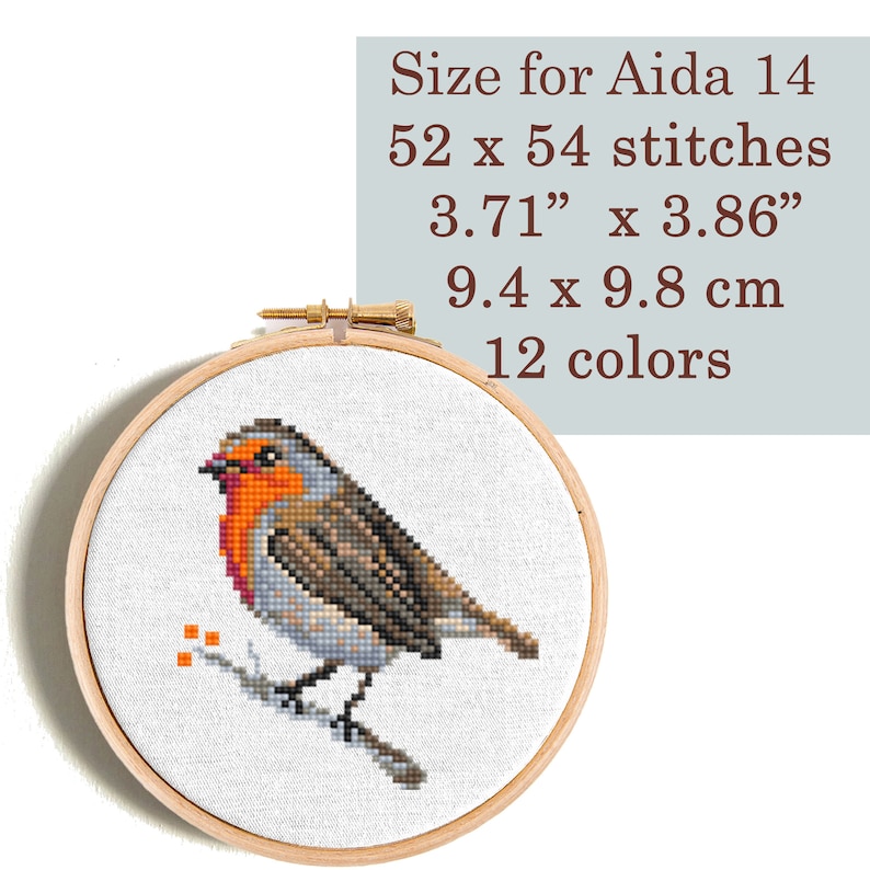 Cross stitch pattern of a robin on a branch with orange berries. The pattern is 52 x 54 stitches and uses 12 colors. The finished size is 3.71 inches by 3.86 inches or 9.4 cm by 9.8 cm. Size for Aida 14.