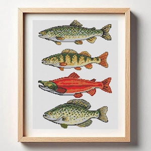 May include: A framed art print featuring four colorful fish in a cross-stitch style. The fish are arranged vertically, showcasing a variety of colors including green, orange, and red. The frame is made of light-colored wood, adding a natural touch.