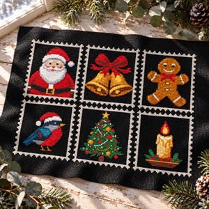 May include: A black cross-stitch fabric featuring six rectangular postage stamp designs. The motifs include Santa Claus, gold bells with a red bow, a gingerbread man, a blue and red bird, a decorated Christmas tree, and a lit candle.