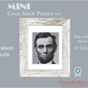 May include: A black and white cross stitch pattern of Abraham Lincoln's portrait in a white frame. The pattern is 50 stitches wide by 60 stitches high and uses 13 colours.