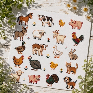 May include: A white fabric square featuring a cross-stitch pattern of various farm animals including a horse, cow, pig, donkey, sheep, goat, rooster, duck, calf, goose, rabbit, hen, guinea fowl, chick, cat, lamb, turkey, and dog with small flowers.