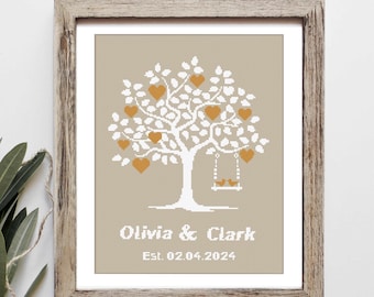May include: A framed print of a white tree with orange hearts and a swing with two birds. The text below the tree reads "Olivia & Clark Est. 02.04.2024".