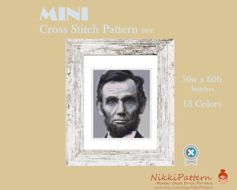 May include: A black and white cross stitch pattern of Abraham Lincoln's portrait in a white frame. The pattern is 50 stitches wide by 60 stitches high and uses 13 colours.