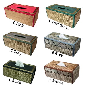 May include: Six tissue box covers in various colors and patterns. The covers are made of woven natural fibers and have a fabric lining. The colors include pink, teal green, gray, black, and brown. The patterns include a simple chevron pattern and a more elaborate pattern with elephants.