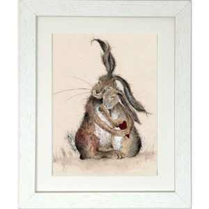 May include: A painting of two brown rabbits hugging each other. The rabbit on the left is holding a red heart. The painting is on a beige background.