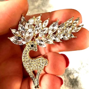 Rhinestone Christmas Reindeer Brooch: Gold Tone Holiday Crystal Deer Pin