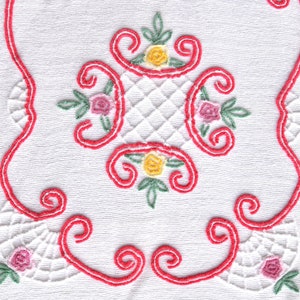 May include: White fabric with red, pink and yellow embroidered floral designs. The flowers are surrounded by a white crocheted pattern.