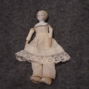 Antique Victorian blonde 1890&#39;s China Head lowbow doll, cloth body, wooden arms, wax legs