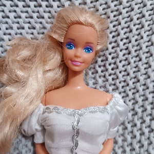Vintage pretty blonde 90&#39;s Barbie wearing Mattel Barbie Bridal Collection #666 dress and white pumps c. 1992