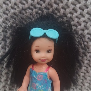Vintage Li'l Friends of Kelly doll Marisa in a cute turquoise floral jumper and hot pink sneakers c. 1994 Mattel
