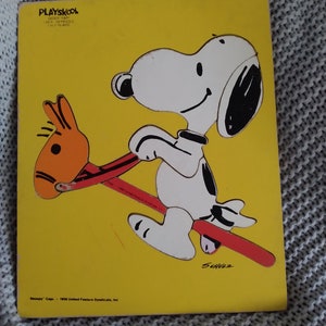 Snoopy on a stick horse - vintage wooden board puzzle c. 1958 United Feature Syndicate
