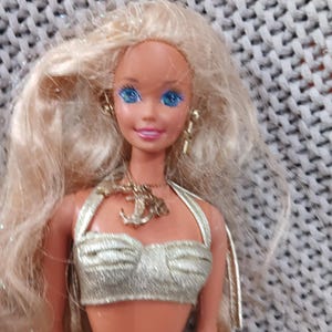 Vintage Sun Sensation Barbie in her complete original outfit including jewelry c. 1991 Mattel