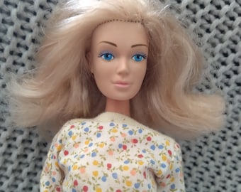 Vintage Fashion Candi doll in labelled Jordache floral sweatshirt and denim skirt c. 1978 Mego