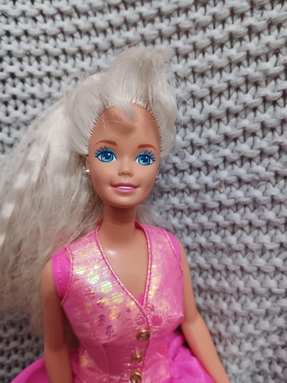 barbie in her pink dress Barbie pink party dress