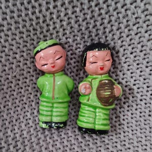 Pair of Vintage Mid Century Chalkware Asian Boy and Girl Figurines in Green Outfits