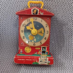 Vintage Fisher Price Wind-Up Wooden Tick Tock Musical Teaching Clock c. 1968 - WORKS