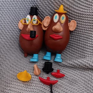Pair of Vintage Romper Room Mr. Potato Heads with body parts and accessories including 2 HTF pipes c. 1978 Hasbro